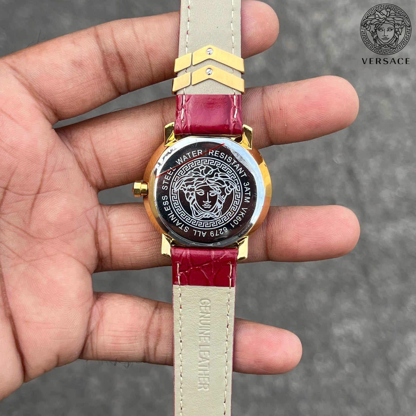 Versace DV25 Round Gold Women's Watch with Red Dial